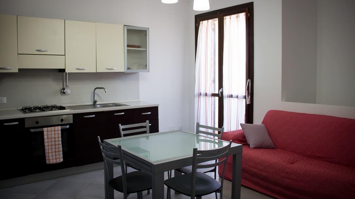 Marsala: Koch- und Essbereich in den Surfer Appartements